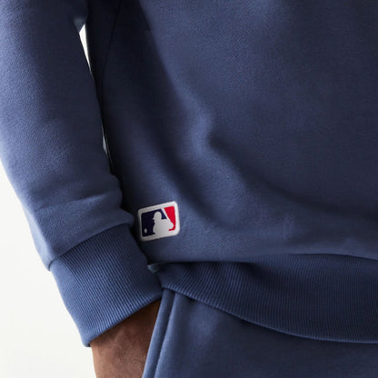 The Male model is wearing LA Dodgers MLB Midi League Essential Dark Blue Oversized Crew Neck Sweater 3