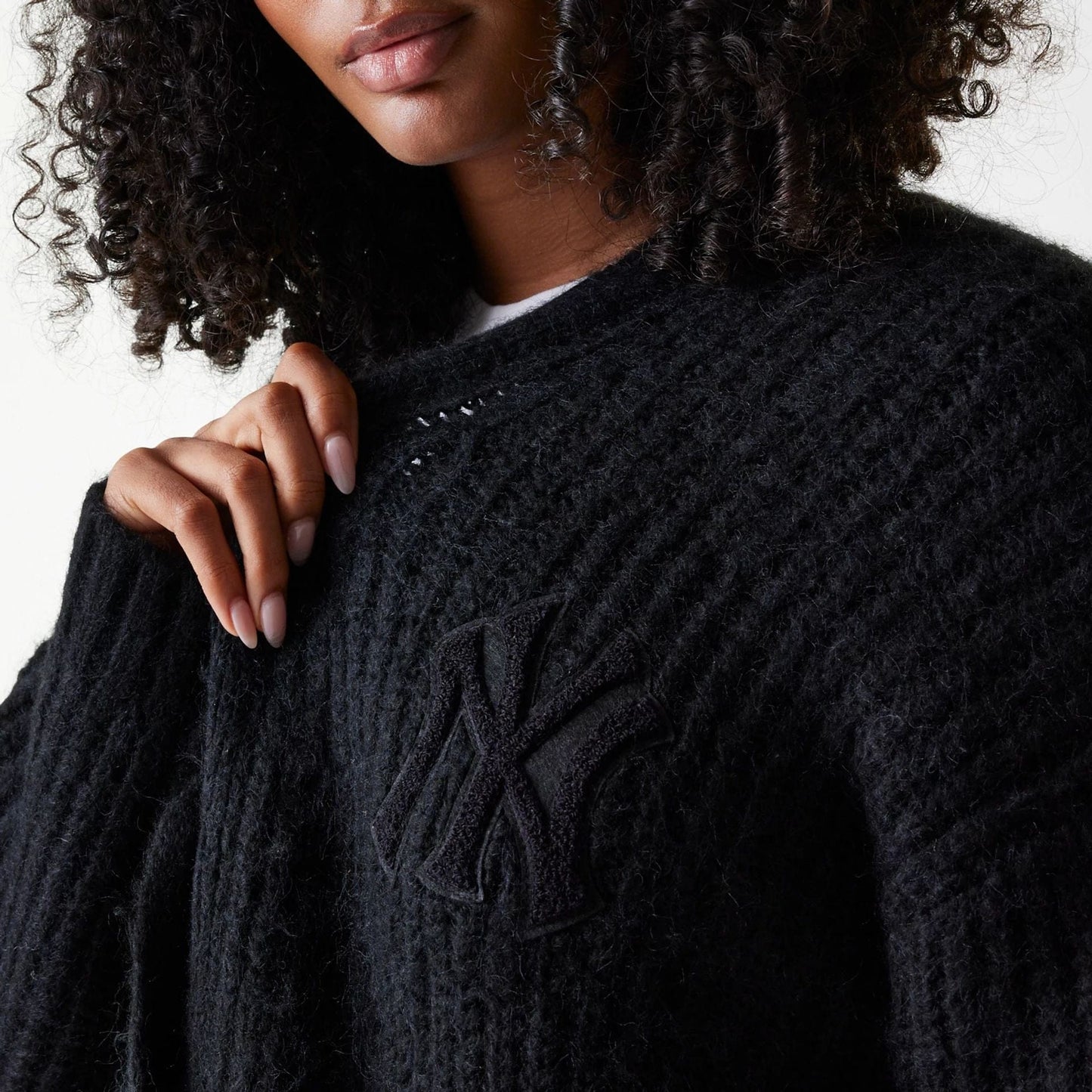 The Female model is wearing New York Yankees Womens MLB Knit Black Cardigan 4