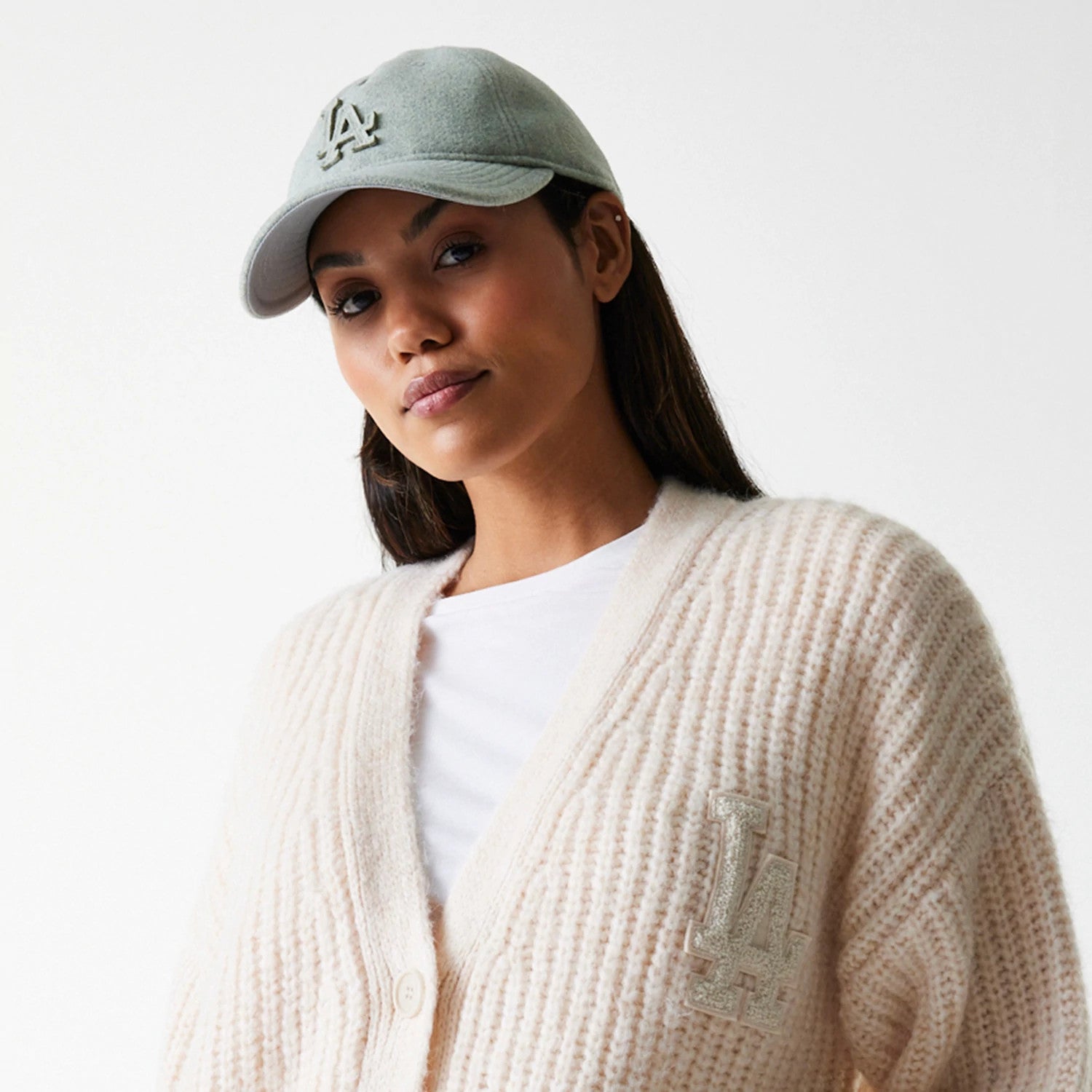 The Female model is wearing LA Dodgers Womens MLB Knit Light Beige Cardigan 6
