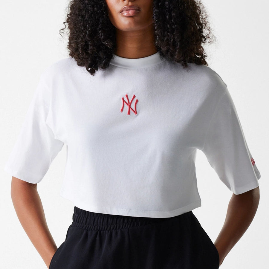 The Female model is wearing New York Yankees Womens League Essential Midi White Crop T-Shirt 3