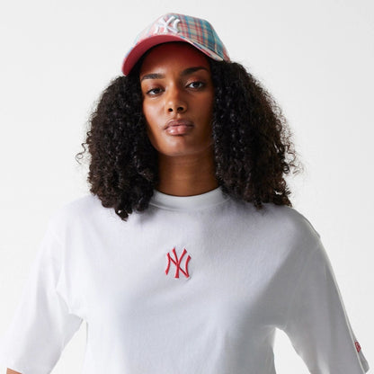 The Female model is wearing New York Yankees Womens League Essential Midi White Crop T-Shirt 6
