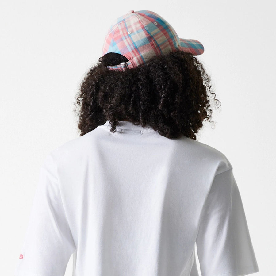 The Female model is wearing New York Yankees Womens League Essential Midi White Crop T-Shirt 7