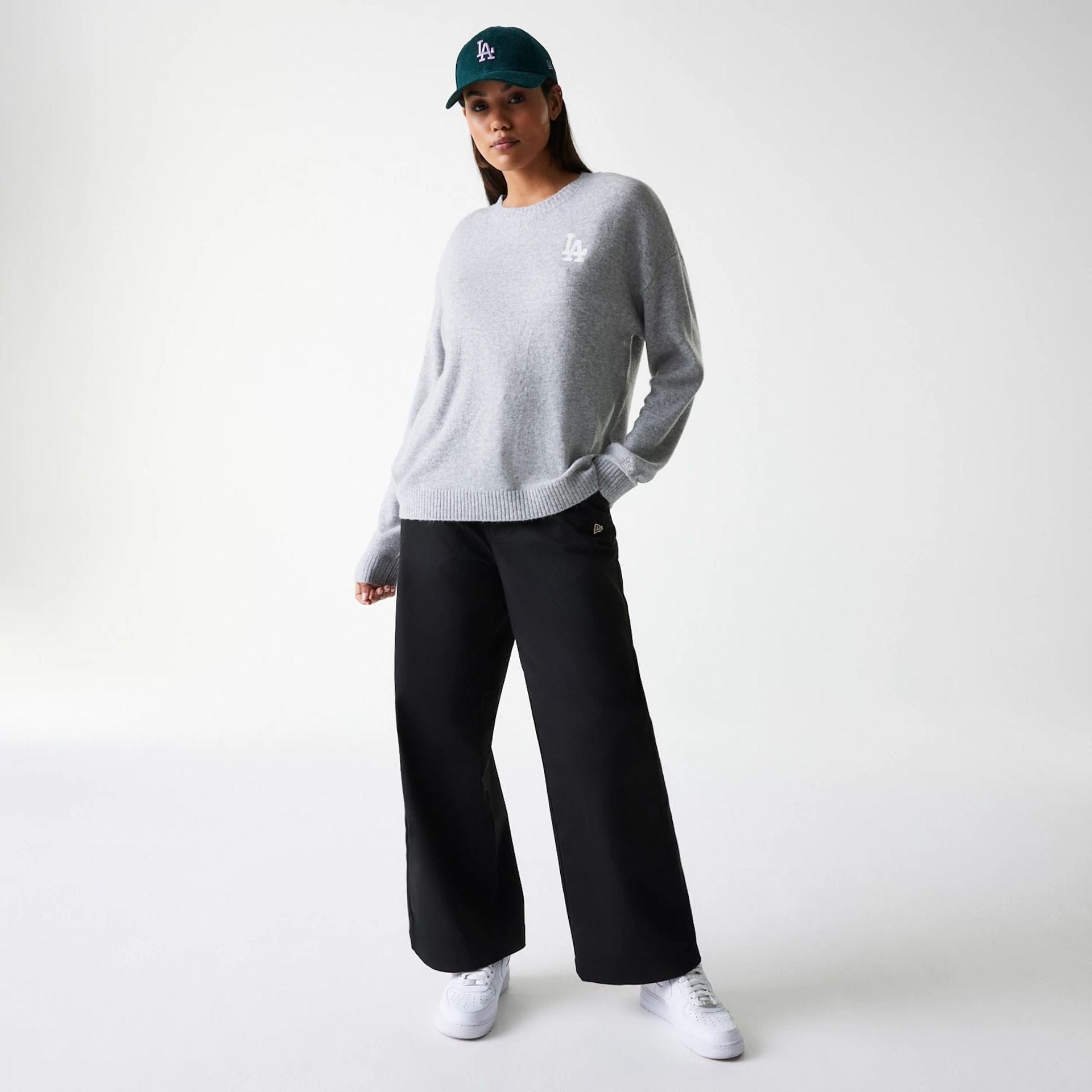 The Female model is wearing LA Dodgers Womens MLB Knit Grey Crew Neck Sweater 8