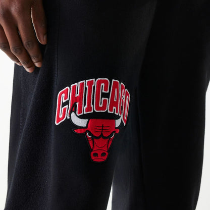 The Male model is wearing Chicago Bulls NBA Arch Graphic Black Joggers 4