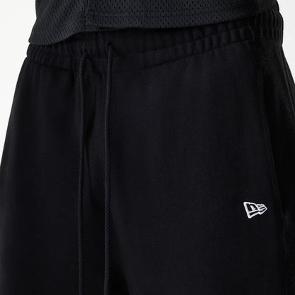 The Male model is wearing Chicago Bulls NBA Arch Graphic Black Joggers 6