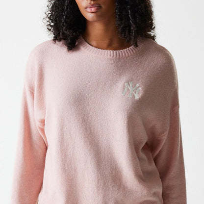 The Female model is wearing New York Yankees Womens MLB Knit Pastel Pink Crew Neck Sweater 3