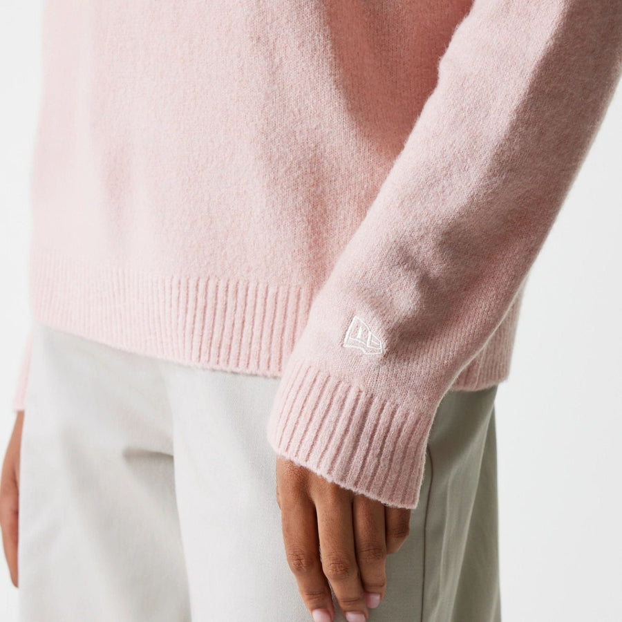 The Female model is wearing New York Yankees Womens MLB Knit Pastel Pink Crew Neck Sweater 7