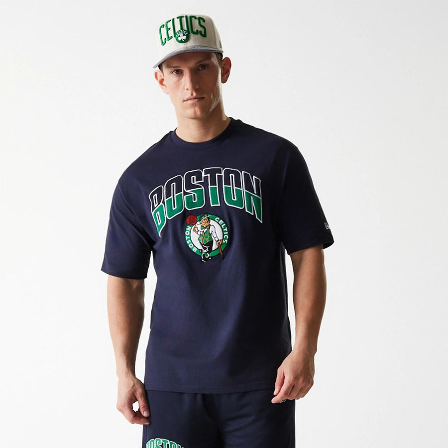 The Male model is wearing Boston Celtics NBA Arch Graphic Navy Oversized T-Shirt 3