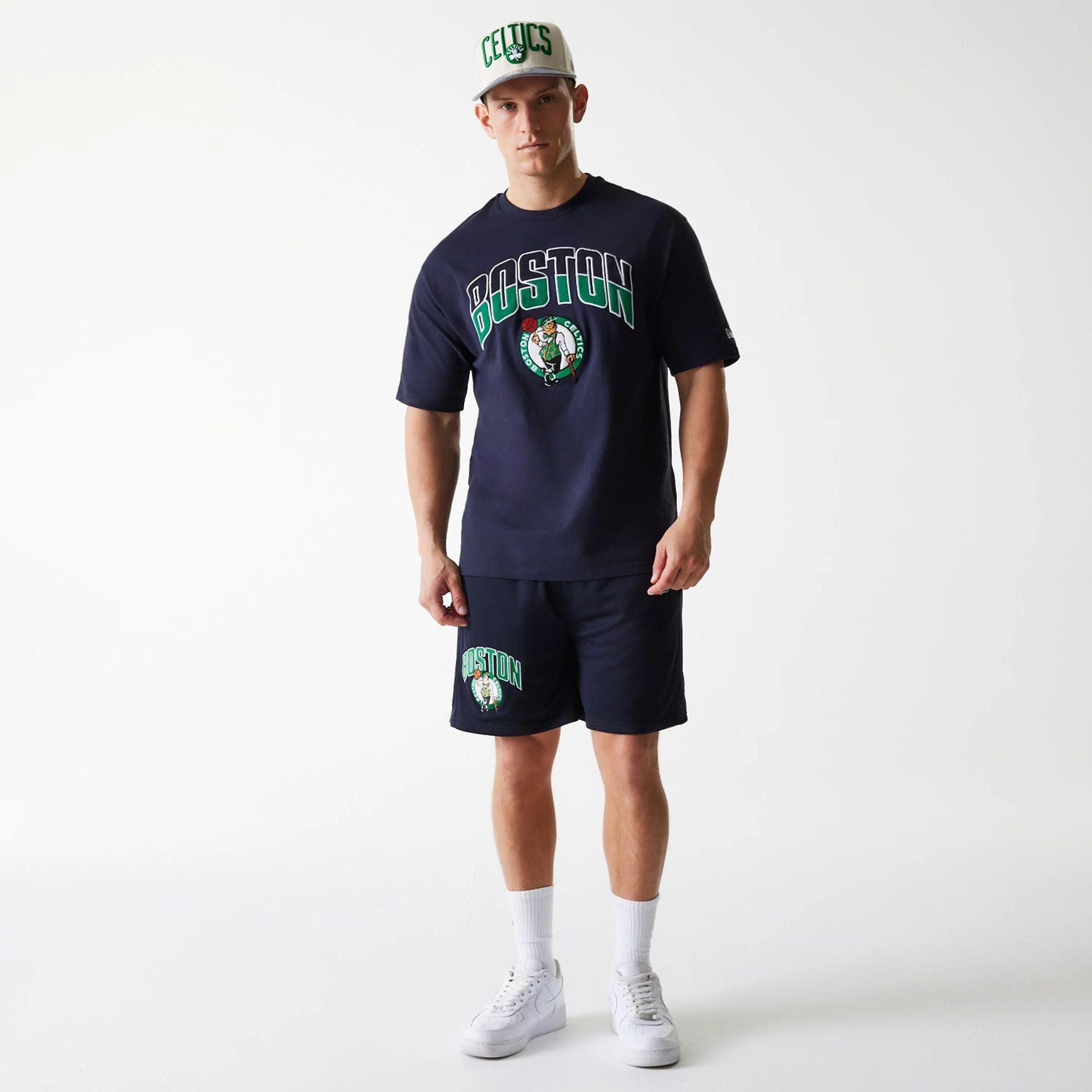 The Male model is wearing Boston Celtics NBA Arch Graphic Navy Oversized T-Shirt 8