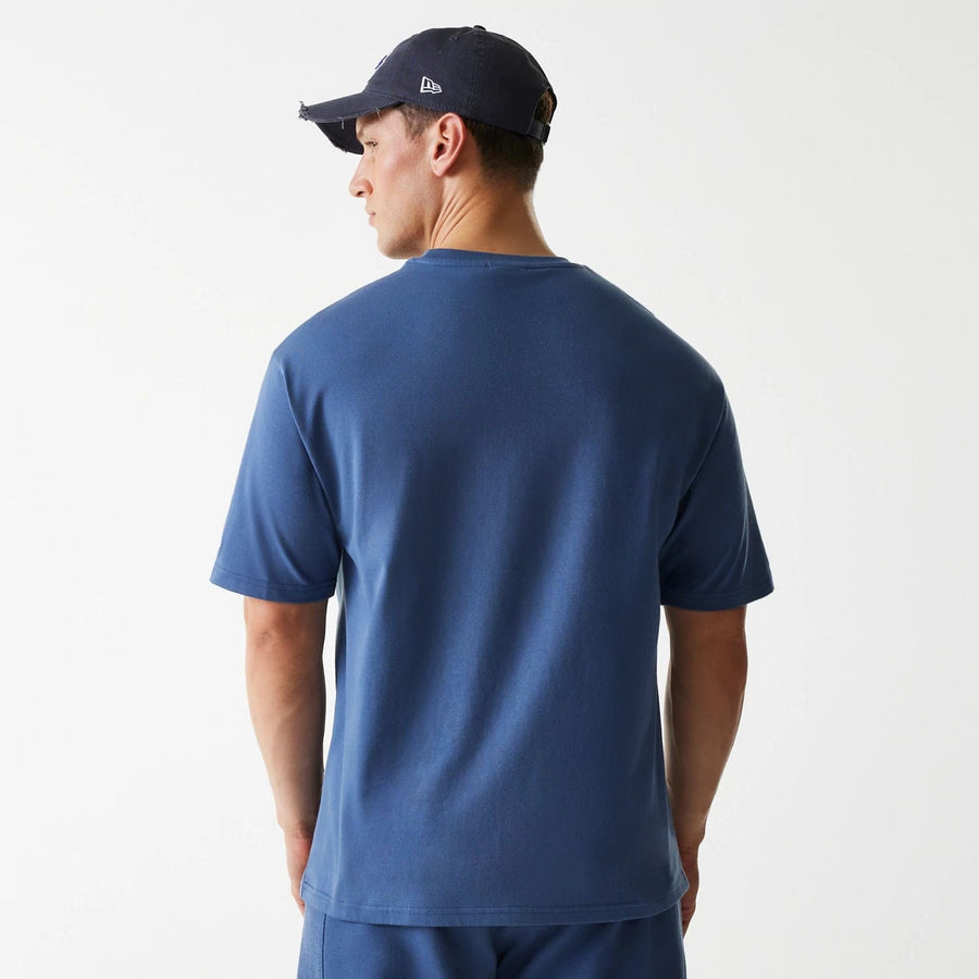 The Male model is wearing LA Lakers NBA Arch Graphic Dark Blue Oversized T-Shirt 2