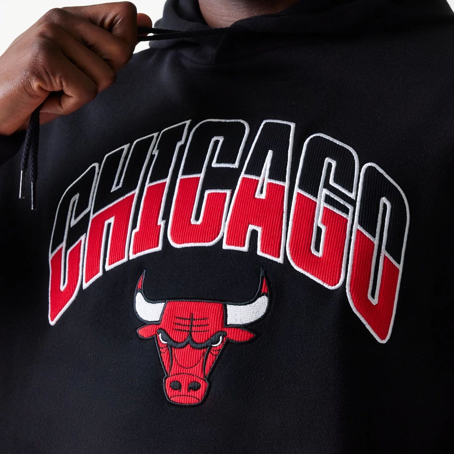 The Male model is wearing Chicago Bulls NBA Arch Graphic Black Oversized Pullover Hoodie 4