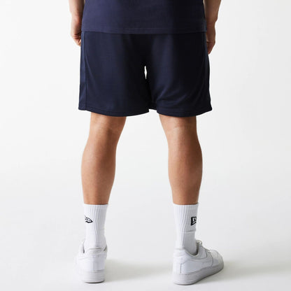 The Male model is wearing Boston Celtics NBA Arch Graphic Navy Mesh Shorts 2