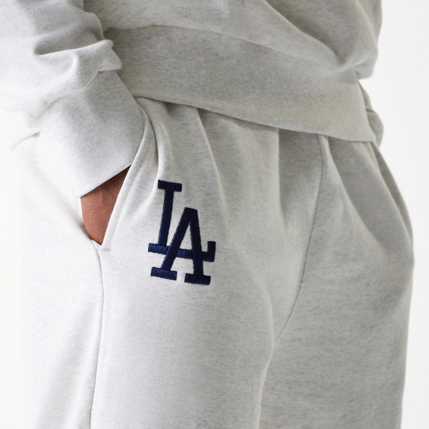 The Male model is wearing LA Dodgers MLB Heritage Pastel Grey Joggers 3