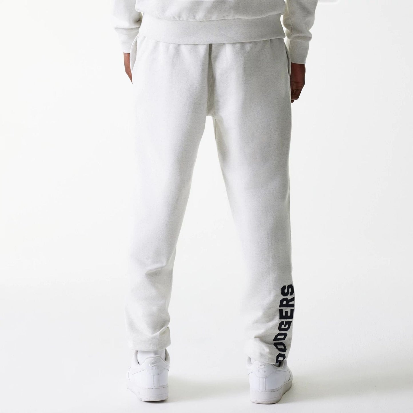 The Male model is wearing LA Dodgers MLB Heritage Pastel Grey Joggers 2