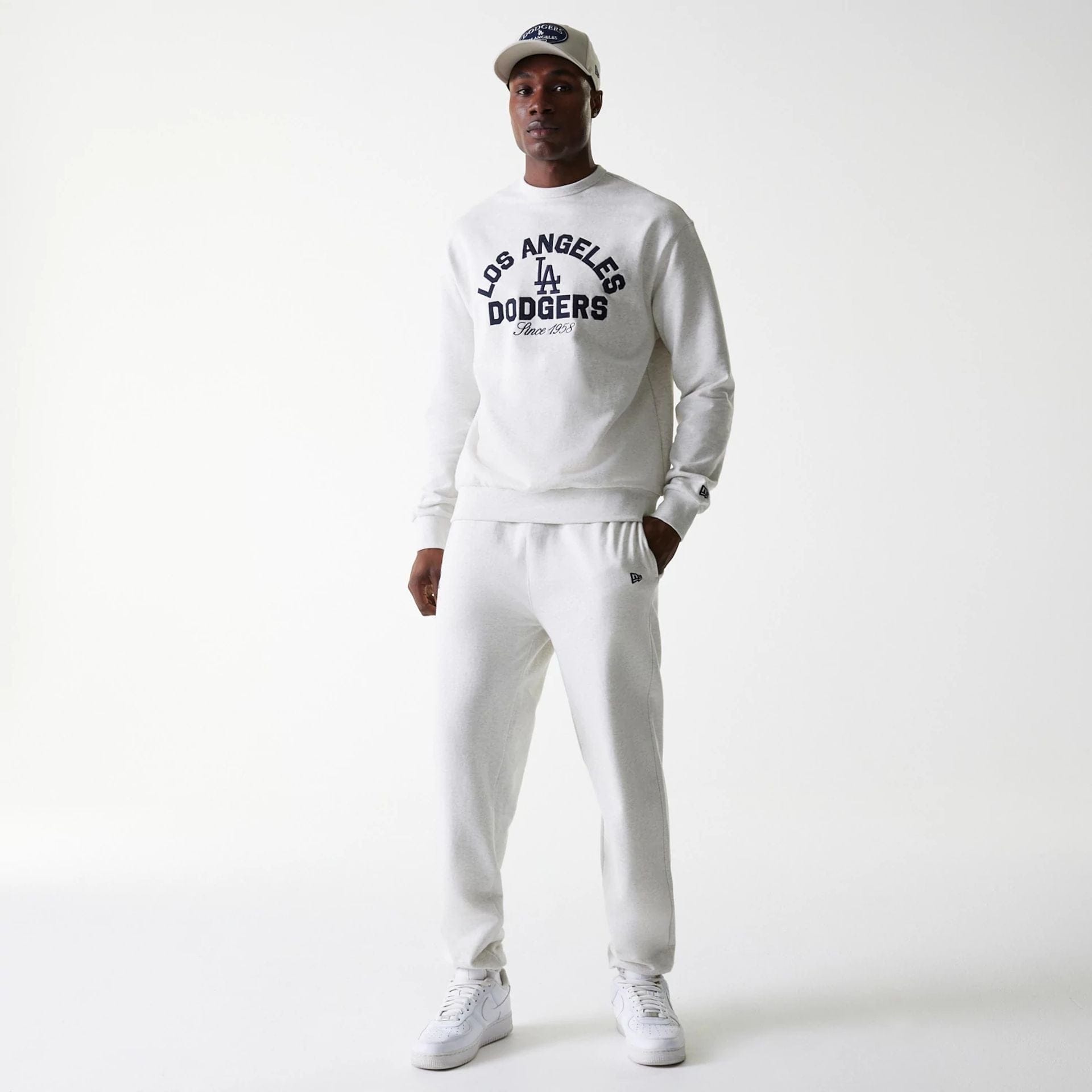 The Male model is wearing LA Dodgers MLB Heritage Pastel Grey Joggers 8