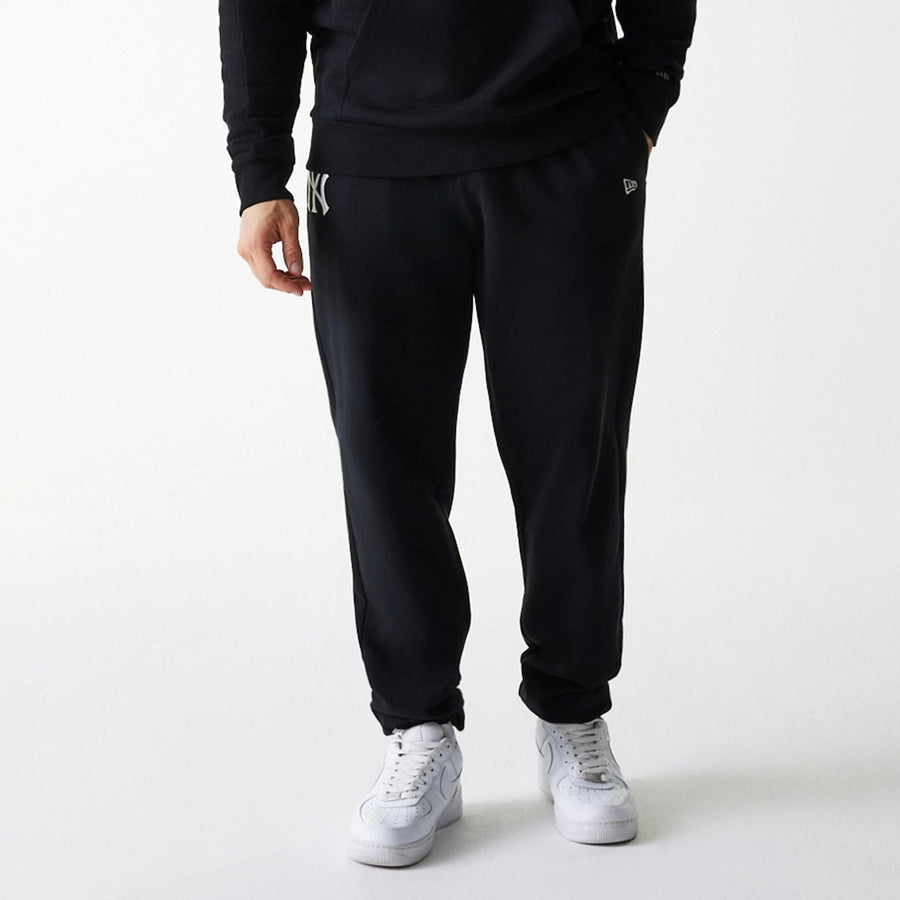The Male model is wearing New York Yankees MLB Heritage Black Joggers 7