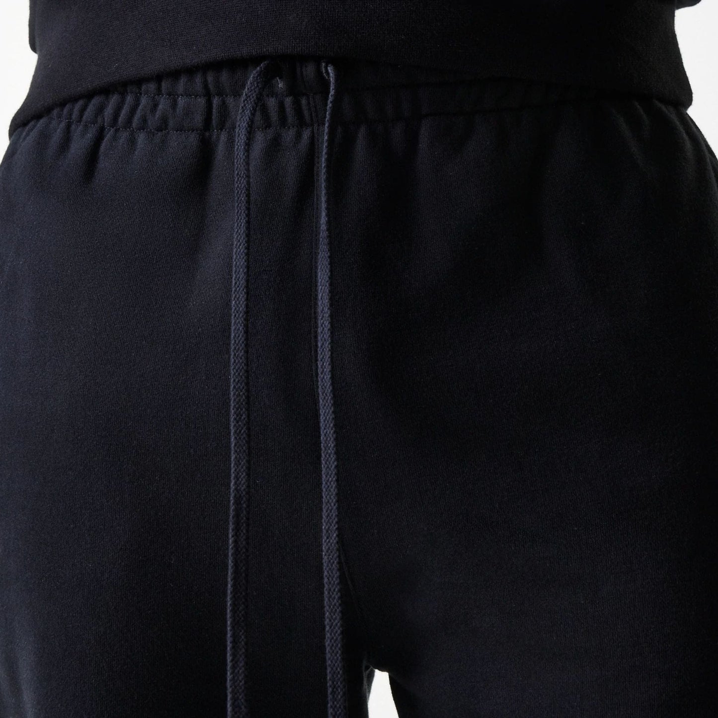 The Male model is wearing New York Yankees MLB Heritage Black Joggers 6