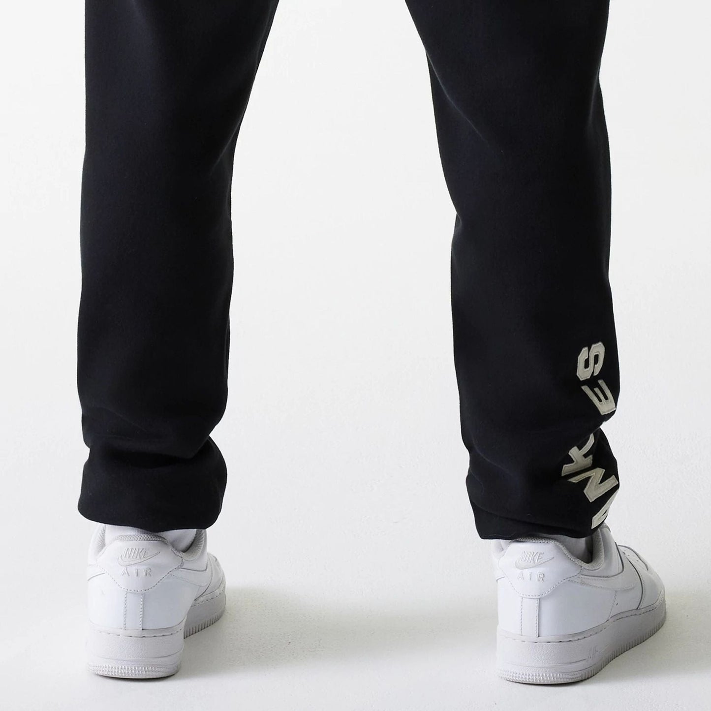 The Male model is wearing New York Yankees MLB Heritage Black Joggers 5