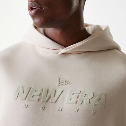 The Male model is wearing New Era Tech Light Beige Oversized Pullover Hoodie 6