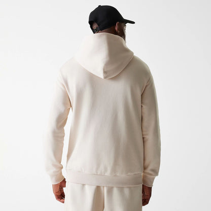 The Male model is wearing New Era Tech Light Beige Oversized Pullover Hoodie 2
