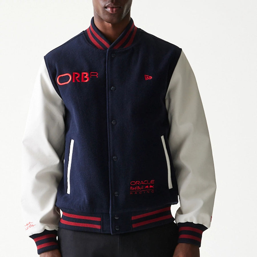 The Male model is wearing Red Bull Racing Dark Blue Varsity Jacket 3