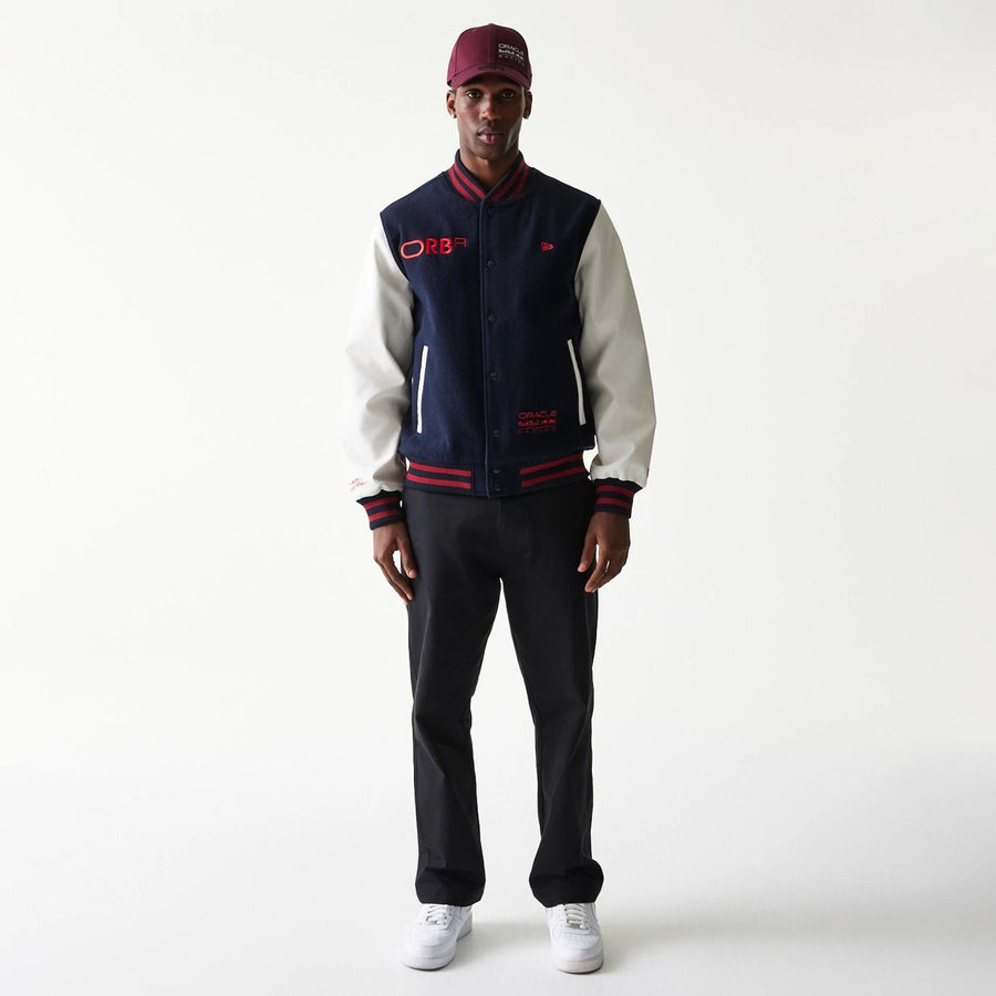 The Male model is wearing Red Bull Racing Dark Blue Varsity Jacket 7