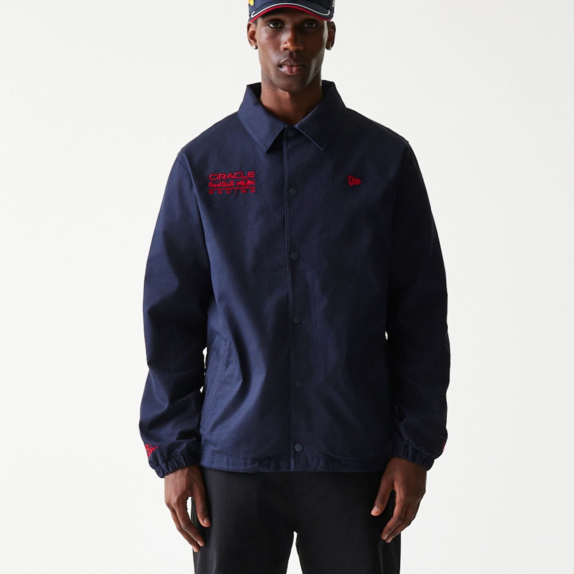 The Male model is wearing Red Bull Racing Dark Blue Oversized Coach Jacket 6