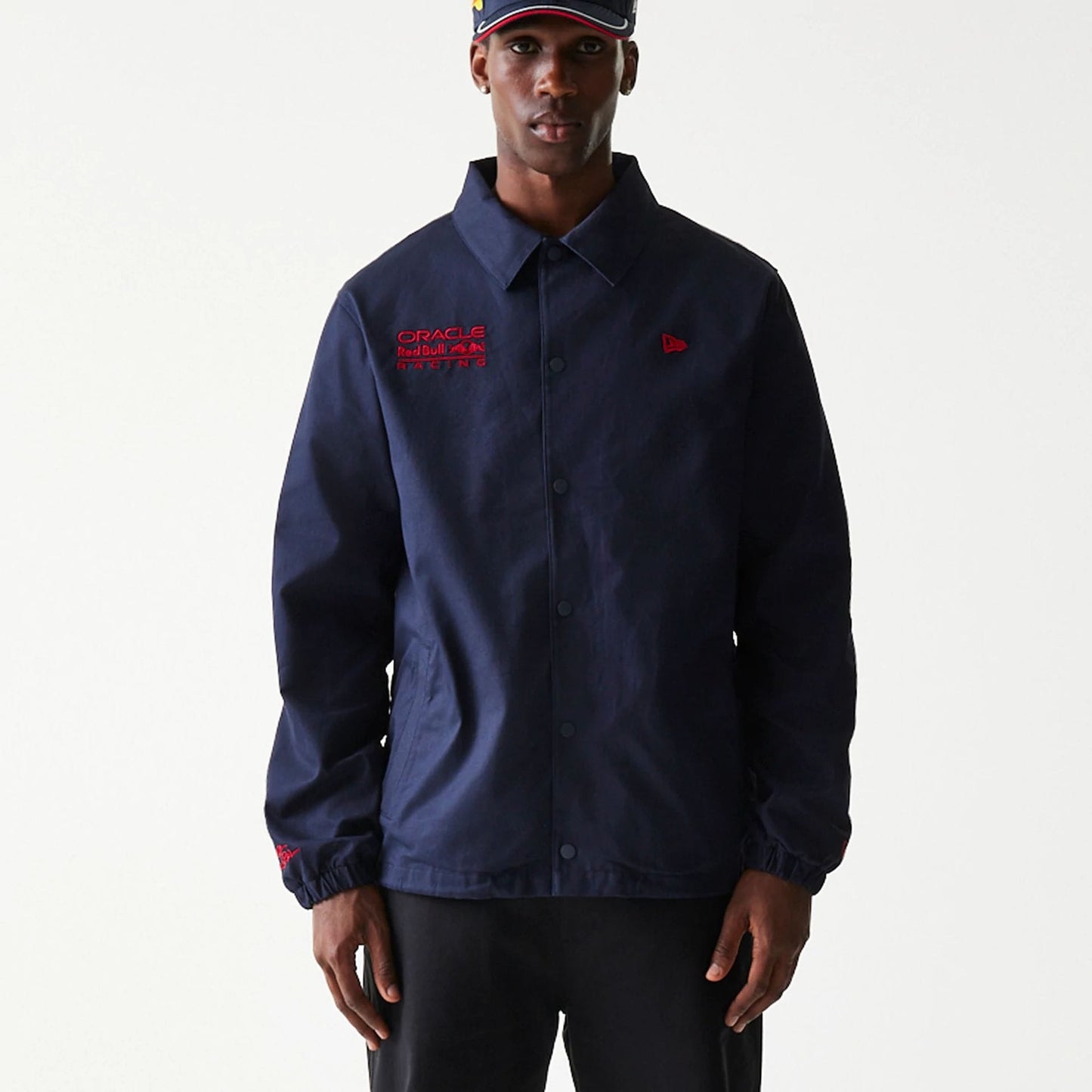 The Male model is wearing Red Bull Racing Dark Blue Oversized Coach Jacket 6