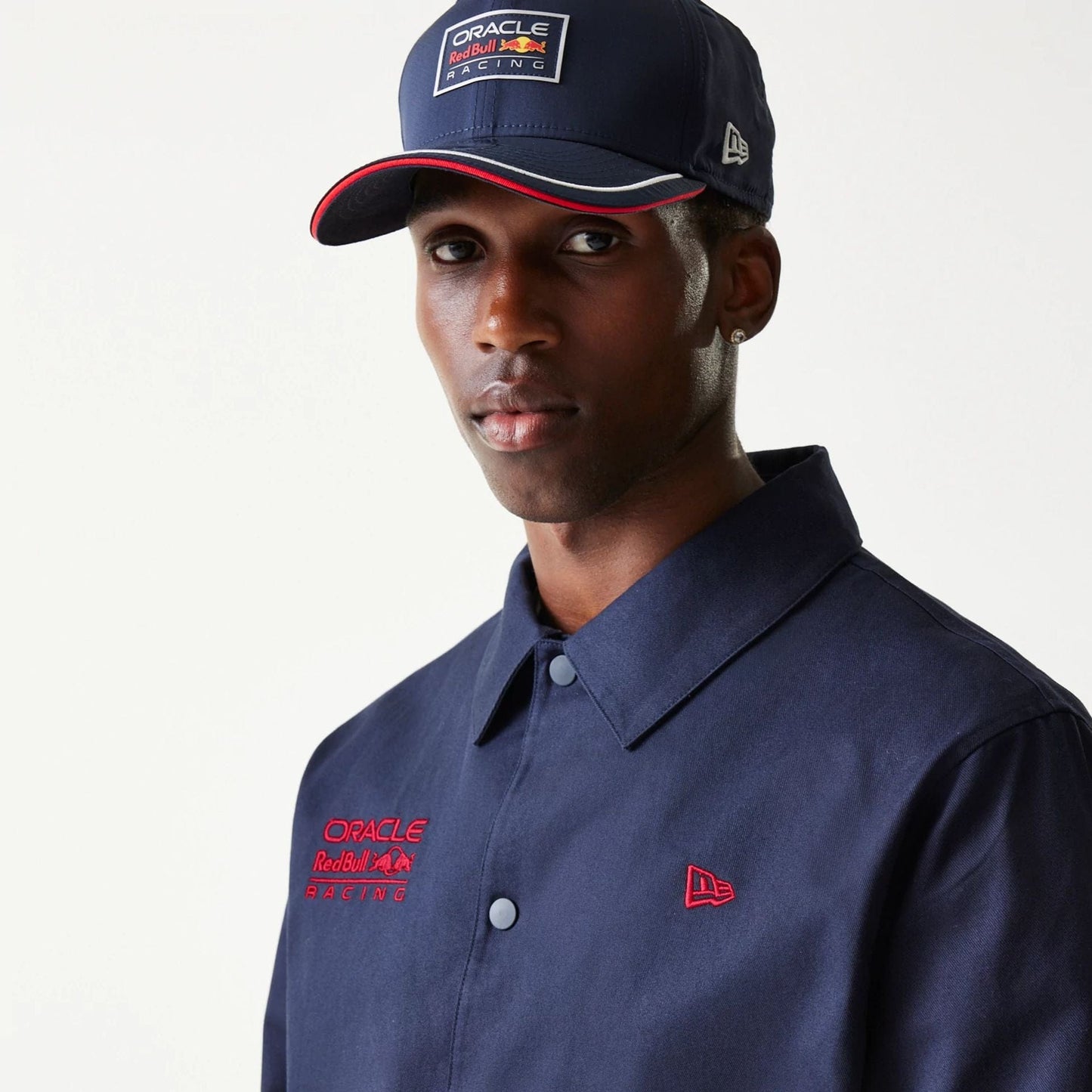 The Male model is wearing Red Bull Racing Dark Blue Oversized Coach Jacket 5