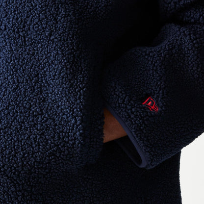 The Male model is wearing Red Bull Racing Dark Blue Hooded Sherpa Jacket 4
