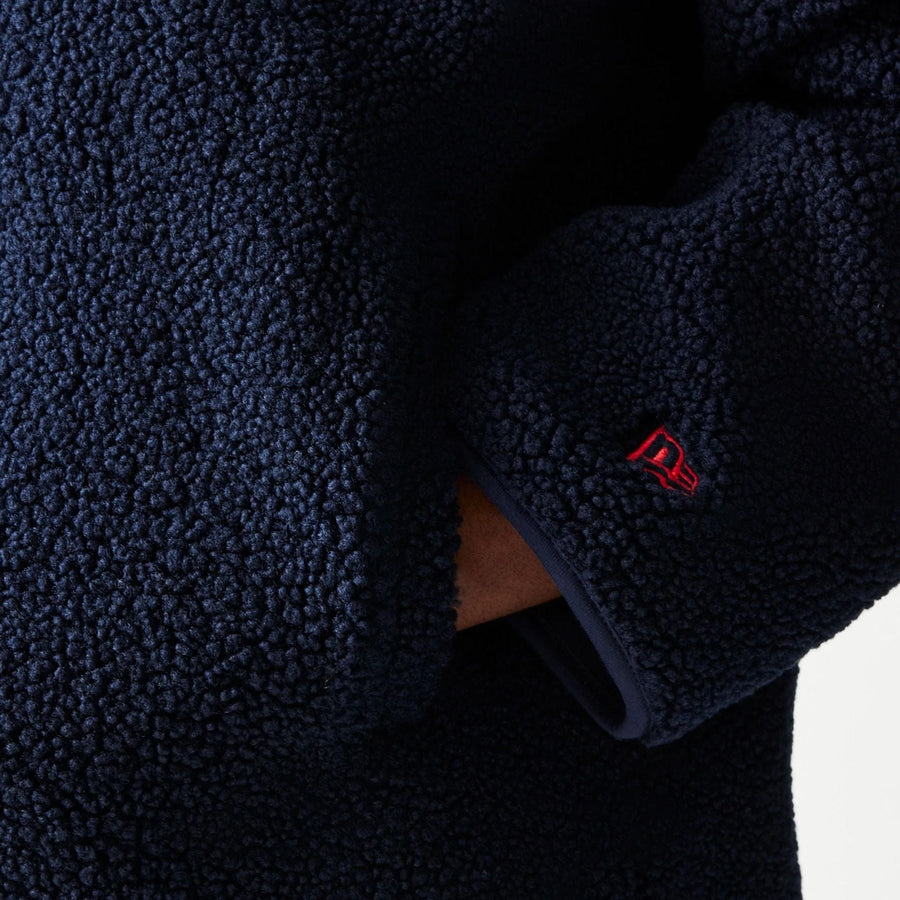The Male model is wearing Red Bull Racing Dark Blue Hooded Sherpa Jacket 4