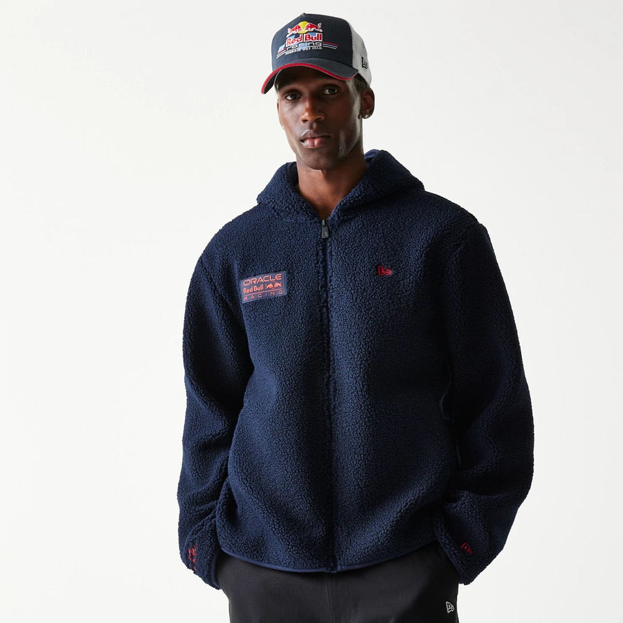 The Male model is wearing Red Bull Racing Dark Blue Hooded Sherpa Jacket 1