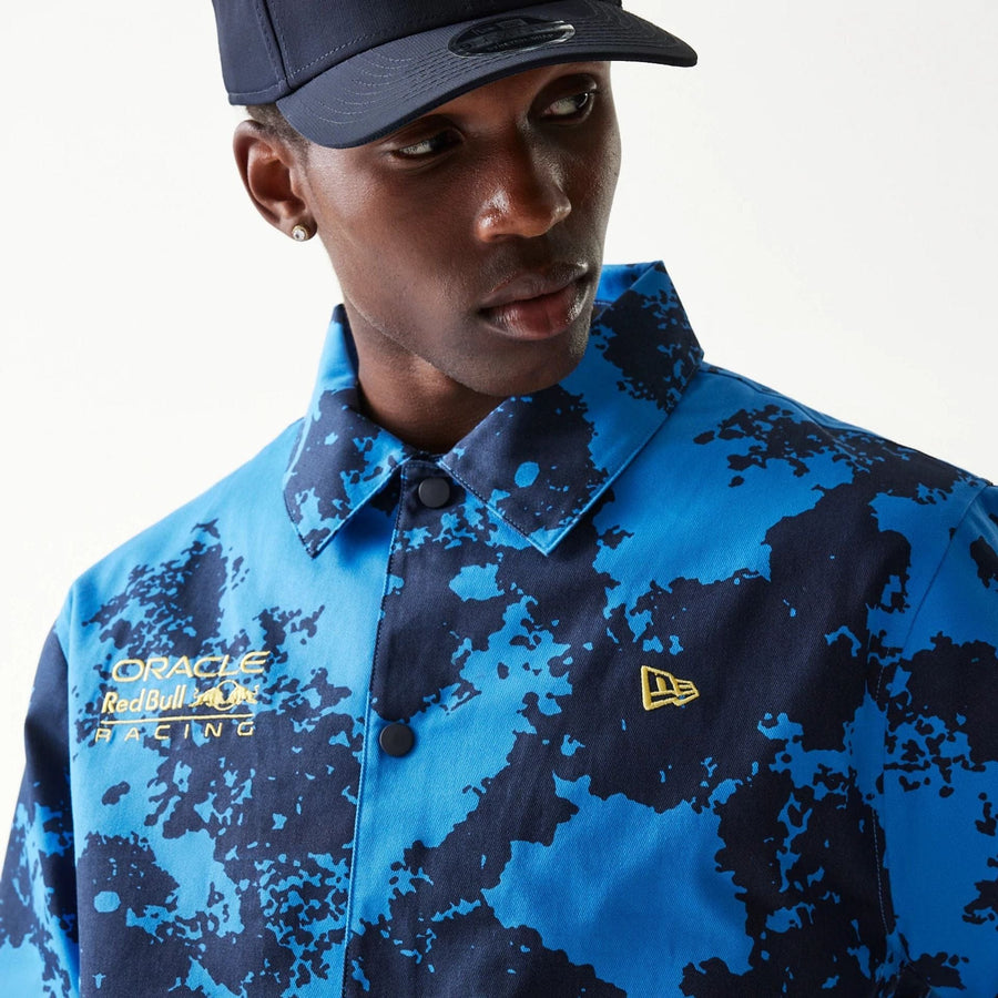The Male model is wearing Red Bull Racing Blue Oversized Coaches Jacket 3