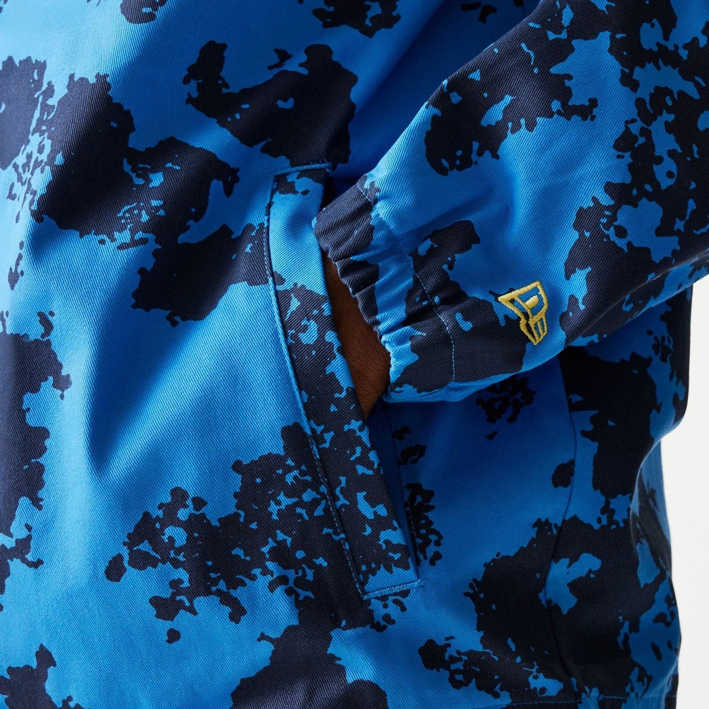 The Male model is wearing Red Bull Racing Blue Oversized Coaches Jacket 5