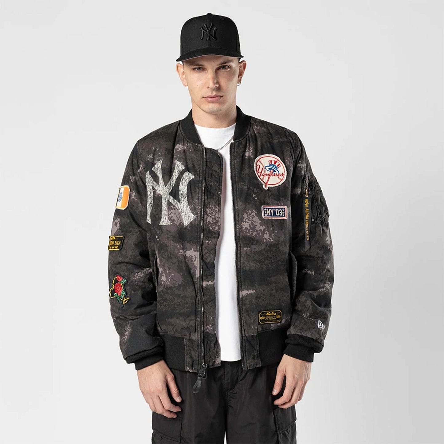 The Male model is wearing New York Yankees MLB X Alpha Black Bomber Jacket 1