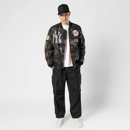 The Male model is wearing New York Yankees MLB X Alpha Black Bomber Jacket 6