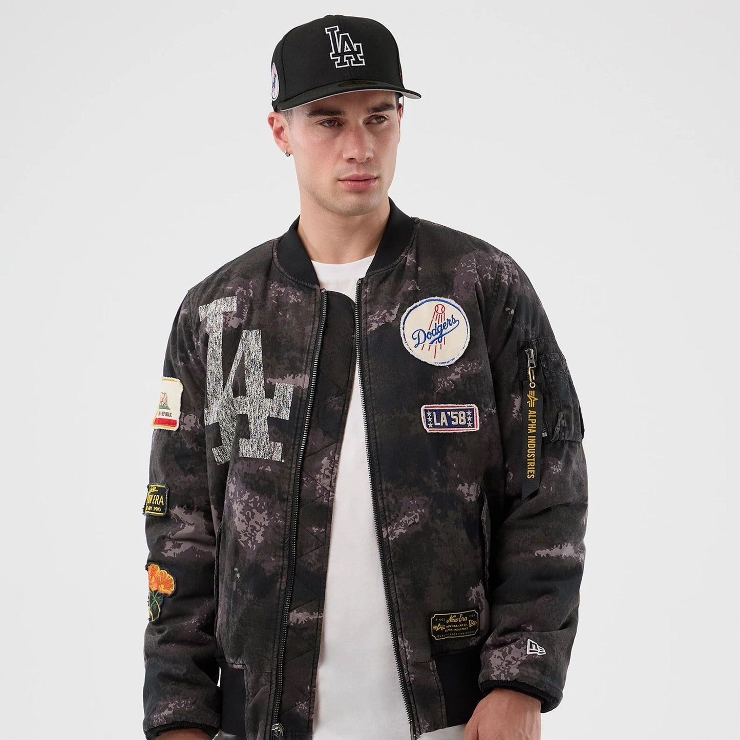 The Male model is wearing LA Dodgers MLB X Alpha Black Bomber Jacket 7