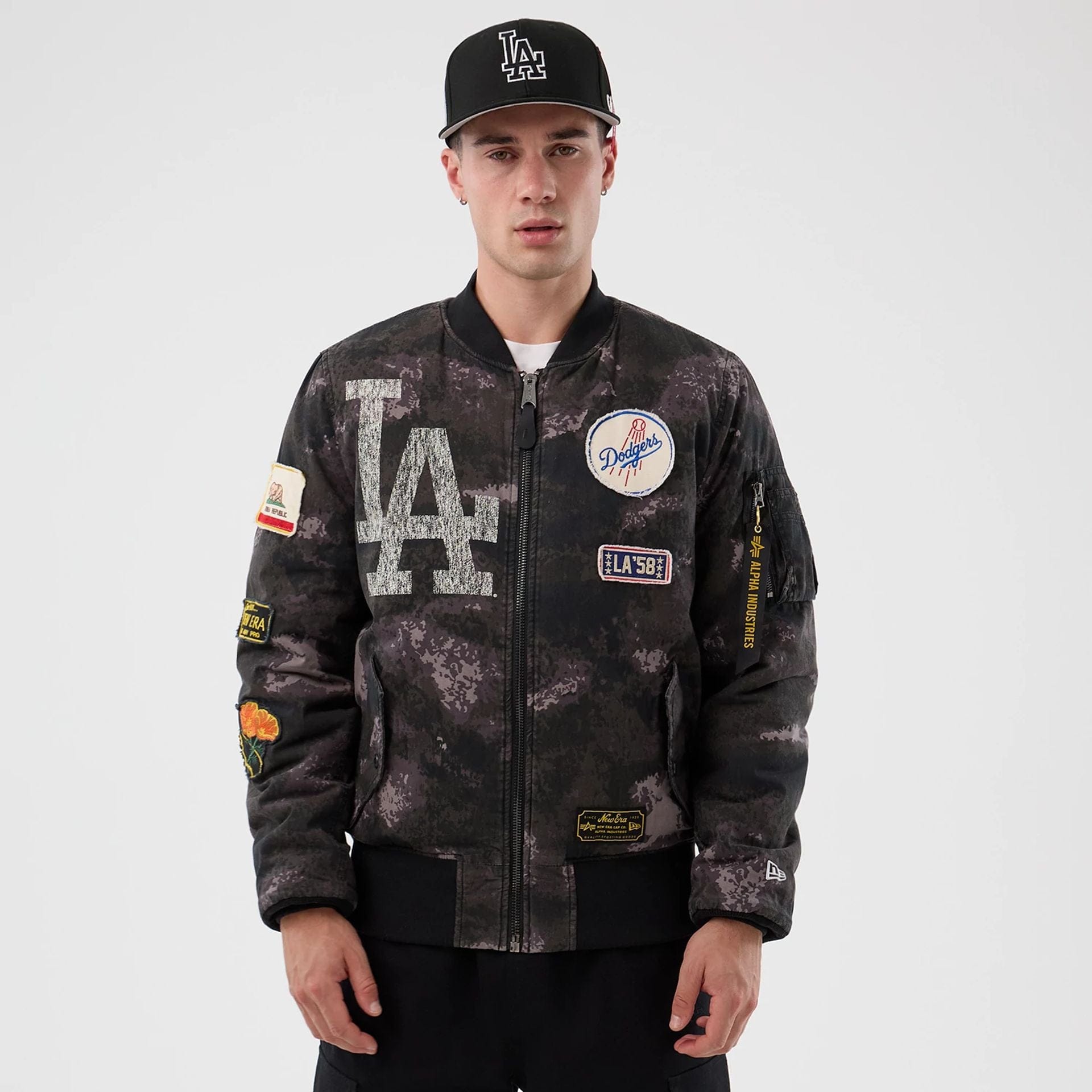 The Male model is wearing LA Dodgers MLB X Alpha Black Bomber Jacket 1