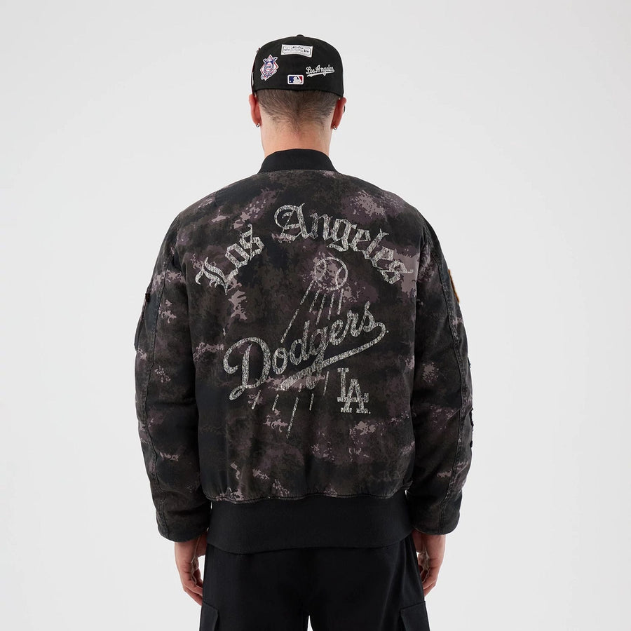 The Male model is wearing LA Dodgers MLB X Alpha Black Bomber Jacket 2