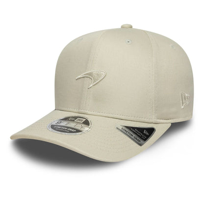 This is a McLaren Racing Seasonal Cream 9FIFTY Stretch Snap Adjustable Cap 1