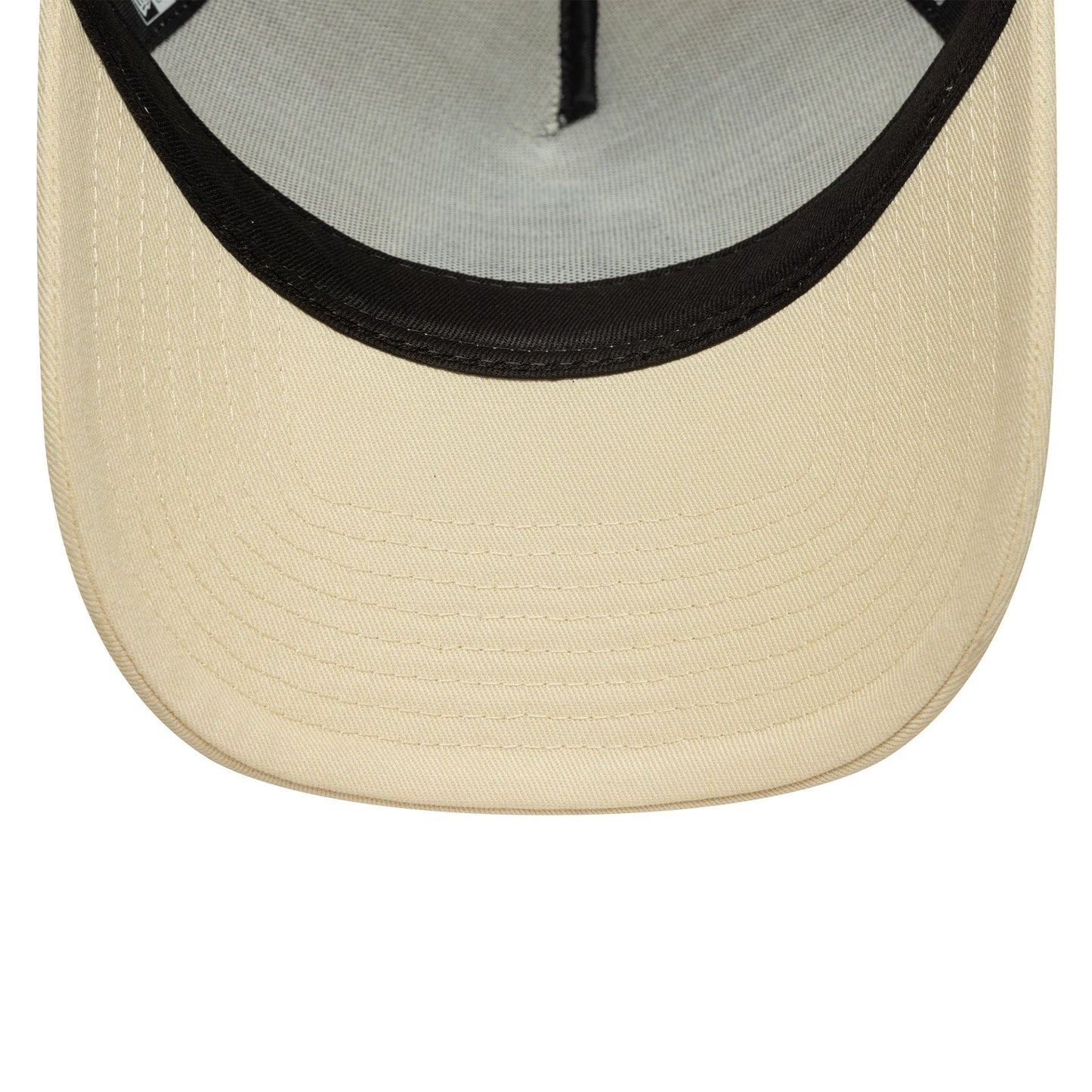 This is a Newcastle United FC Seasonal Cream 9FORTY E-Frame Trucker Adjustable Cap 5