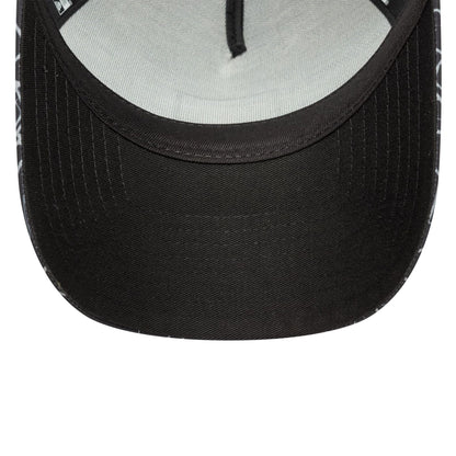 This is a Manchester United FC All Over Print Black 9FORTY E-Frame Trucker Adjustable Cap 5