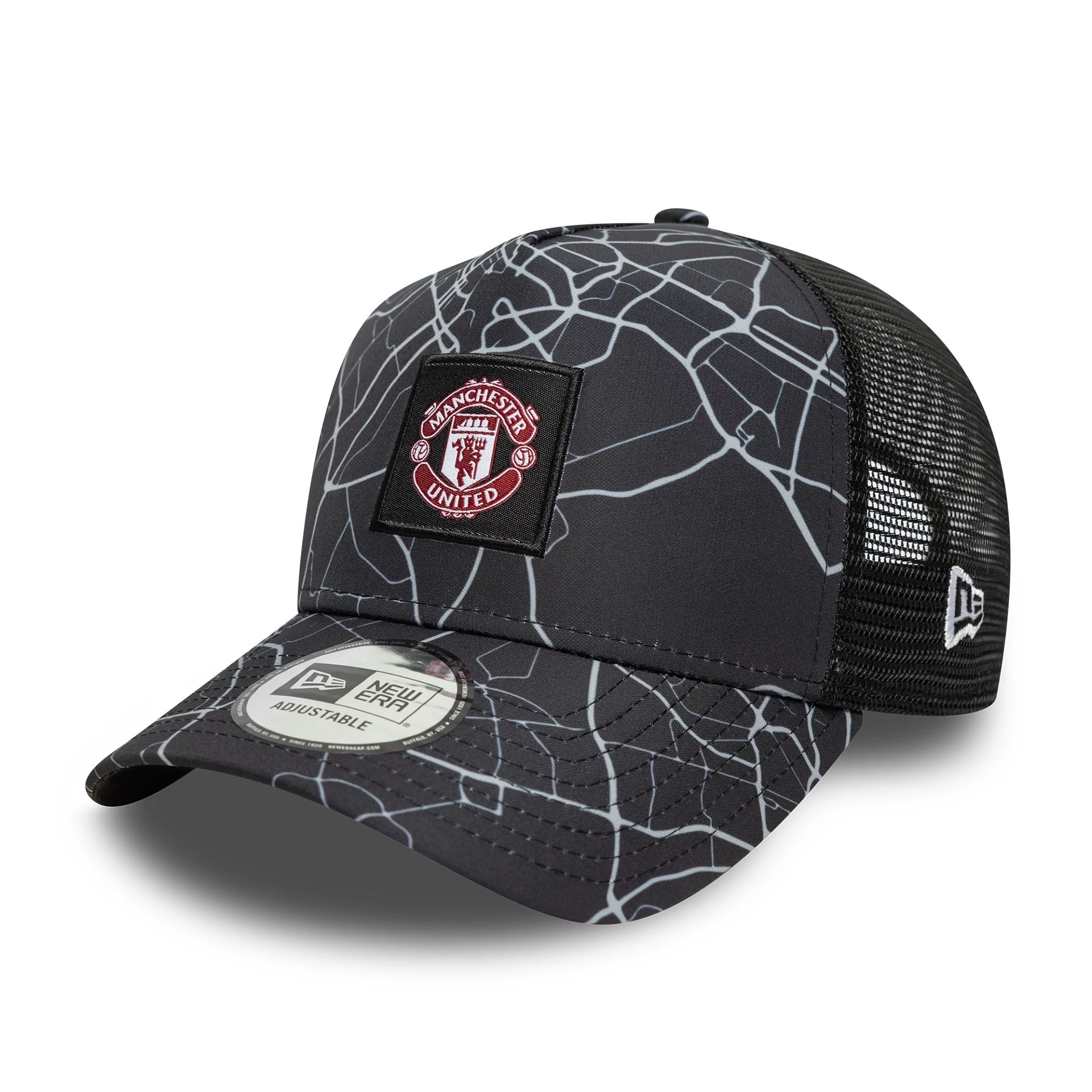 This is a Manchester United FC All Over Print Black 9FORTY E-Frame Trucker Adjustable Cap 1