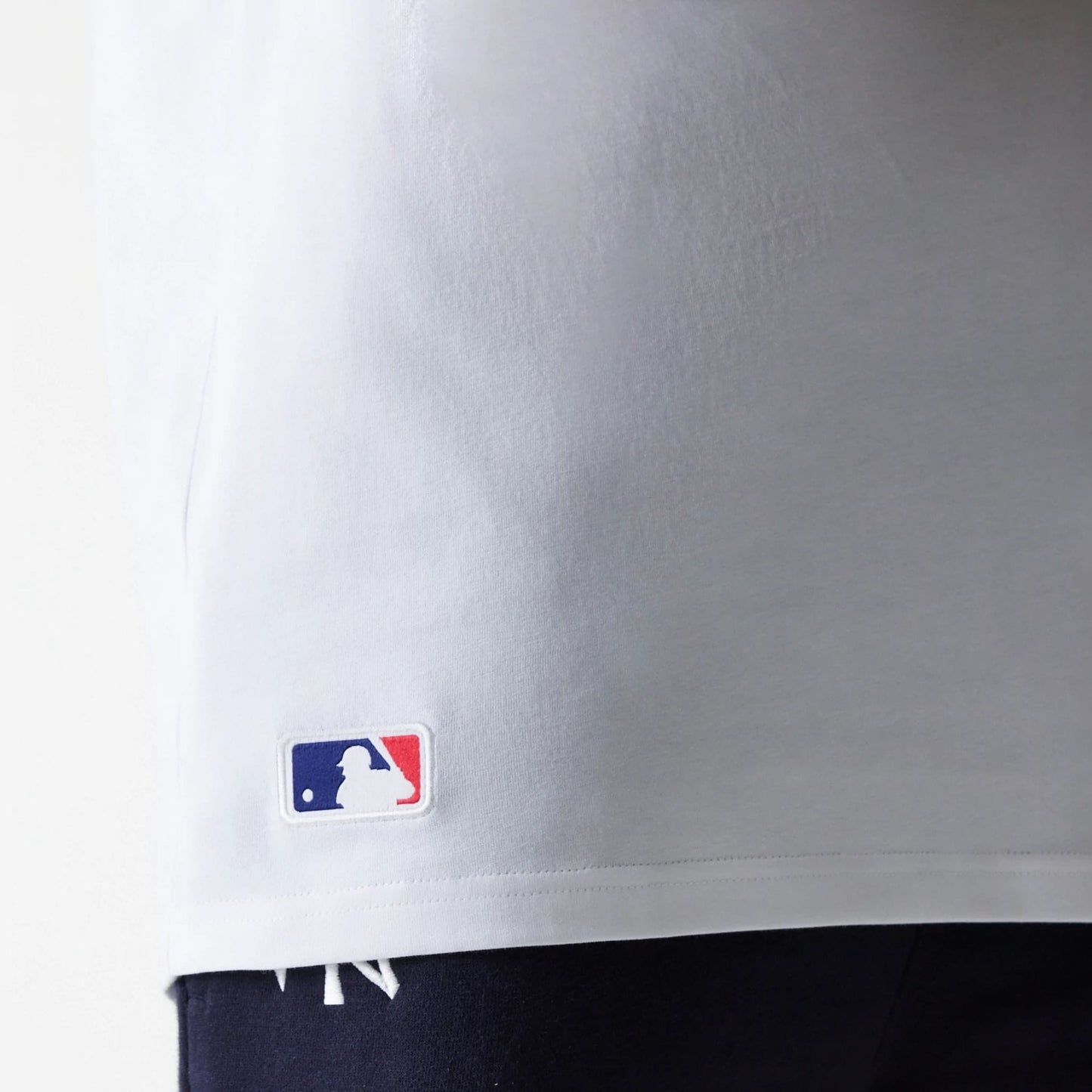The Male model is wearing New York Yankees MLB Midi White Sleeveless T-Shirt 6