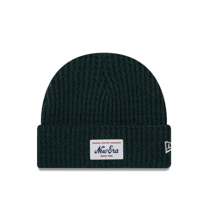 This is a New Era Short Waffle Dark Green Skull Knit Beanie Hat 1