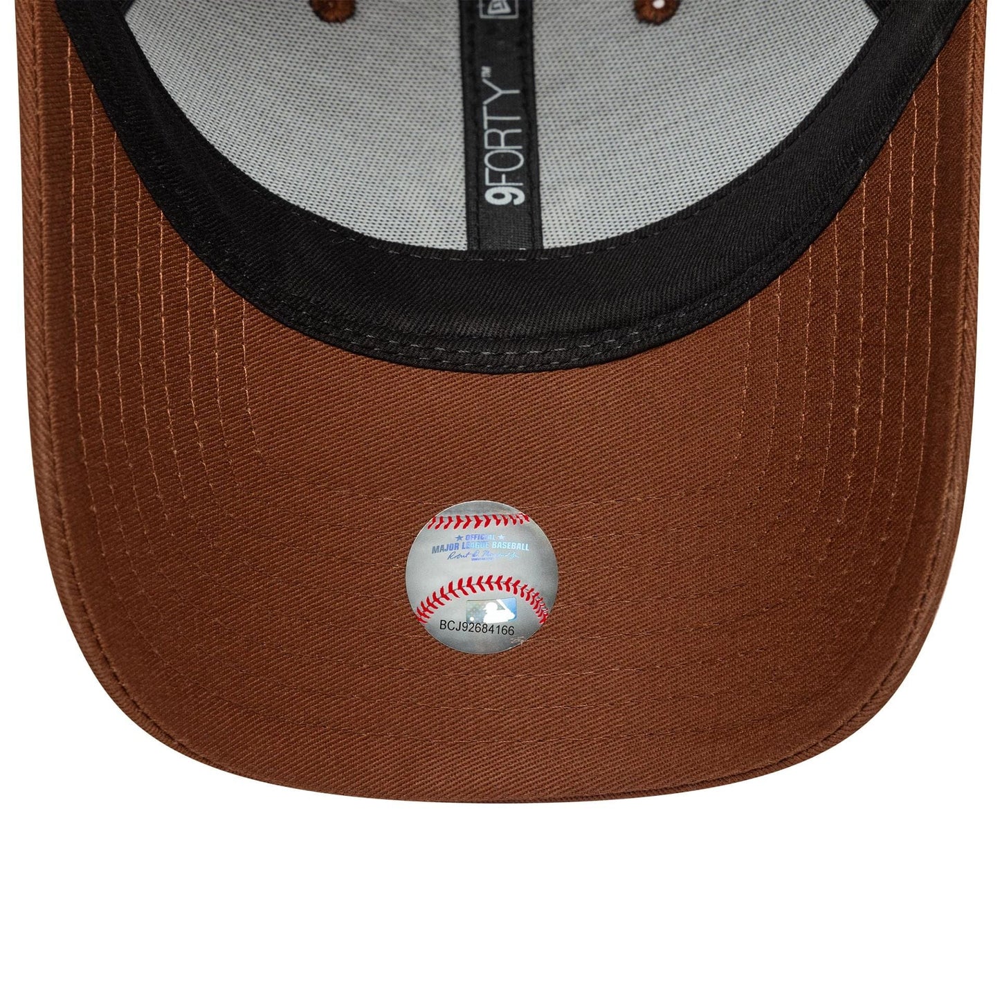 This is a New York Yankees MLB Homefield Brown 9FORTY Trucker Adjustable Cap 5