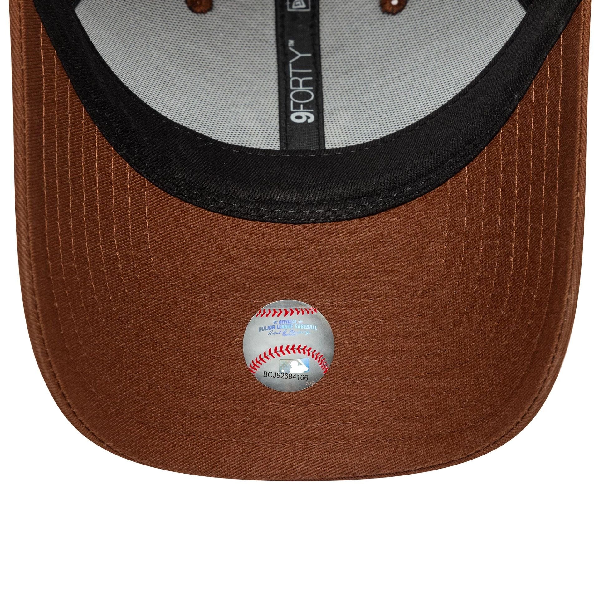 This is a New York Yankees MLB Homefield Brown 9FORTY Trucker Adjustable Cap 5