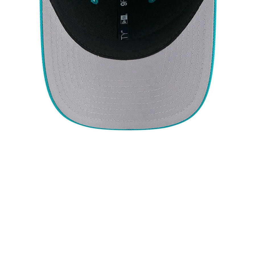 Pictured is this NFL Team Miami Dolphins 9FORTY M-Crown cap in turquoise. 2