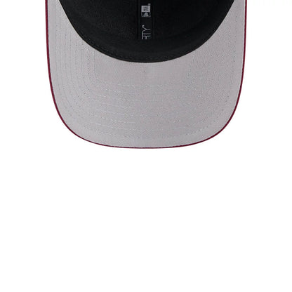 Pictured is this NFL Team Washington Commanders 9FORTY M-Crown cap in dark red. 2