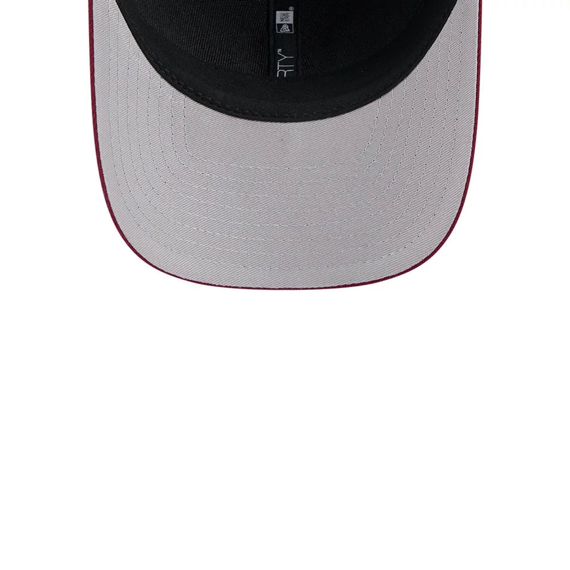 Pictured is this NFL Team Washington Commanders 9FORTY M-Crown cap in dark red. 2